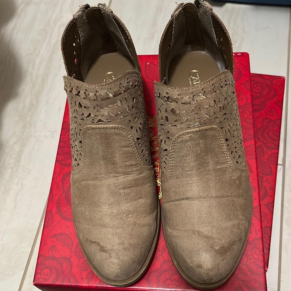 Booties by Carlos Santana